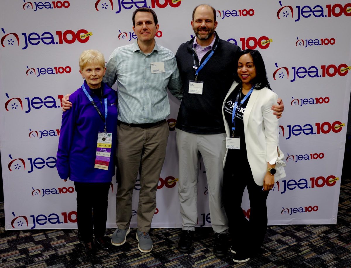 Former directors Linda Puntney, MJE, Kelly Furnas, MJE and Kelly Glasscock, CJE pose with current JEA Executive Director Veronica Purvis, MSM, CAE at the JEA Centennial celebration April 4, 2024.